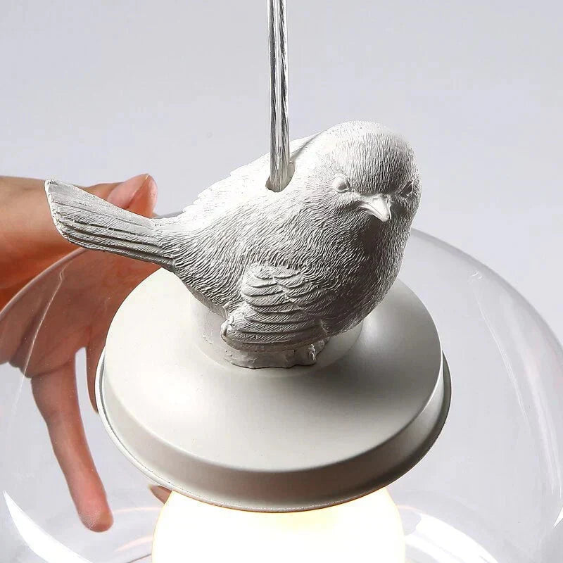 Avelora | Lámpara colgante con pájaro y cilindro de vidrio