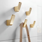 ELVANOR – Modernos ganchos de pared de latón dorado para batas de baño, para una suspensión compacta y elegante