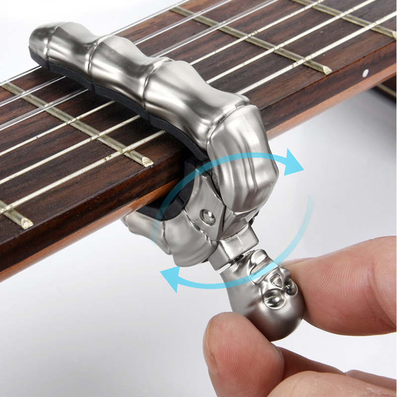 Capo de Guitarra en Forma de Calavera - Juguetes y Regalos