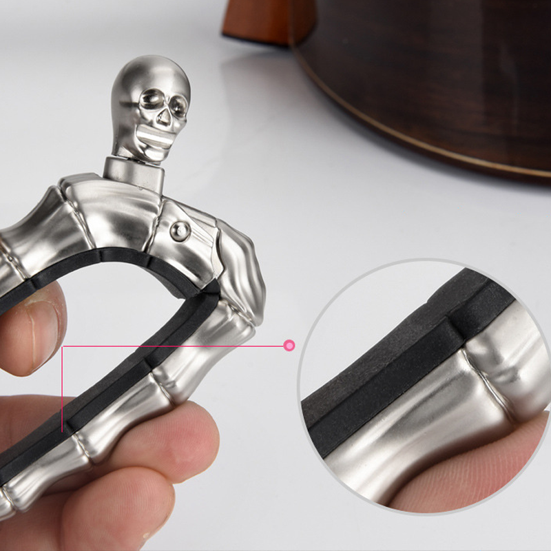 Capo de Guitarra en Forma de Calavera - Juguetes y Regalos