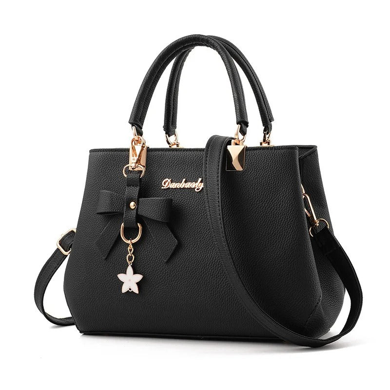 Bolso messenger para mujeres con charm de flores