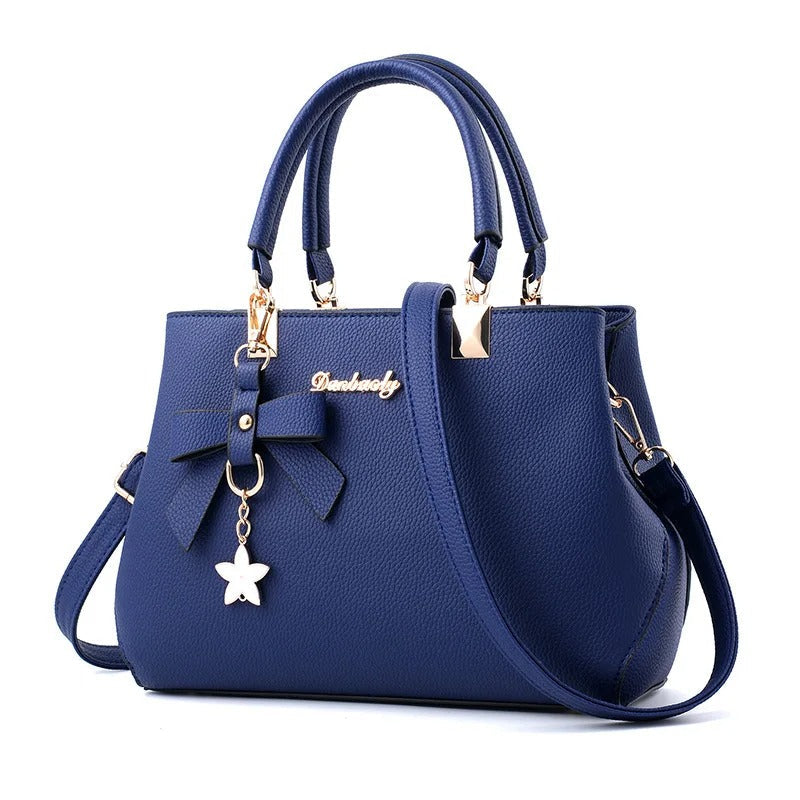 Bolso messenger para mujeres con charm de flores