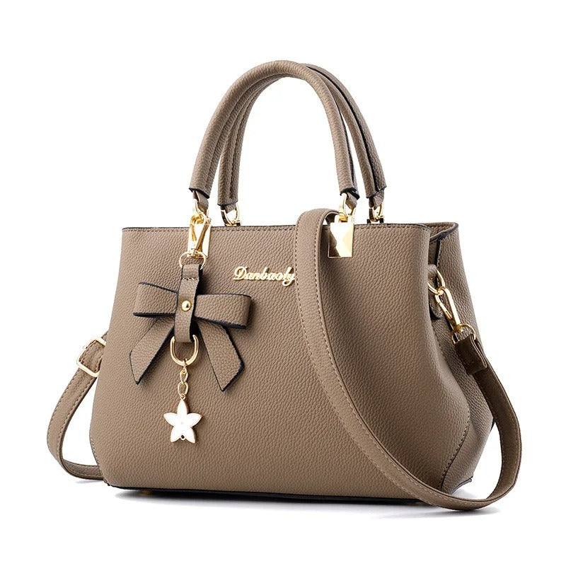Bolso messenger para mujeres con charm de flores