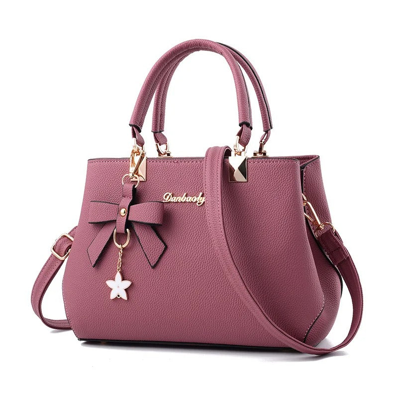 Bolso messenger para mujeres con charm de flores