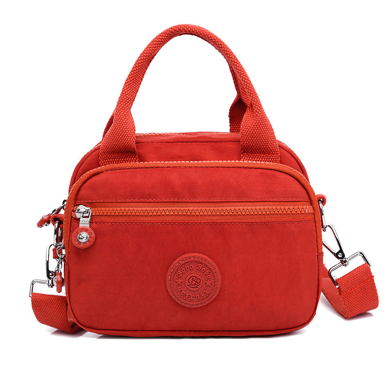 Bolso de mano impermeable para damas con varios compartimentos