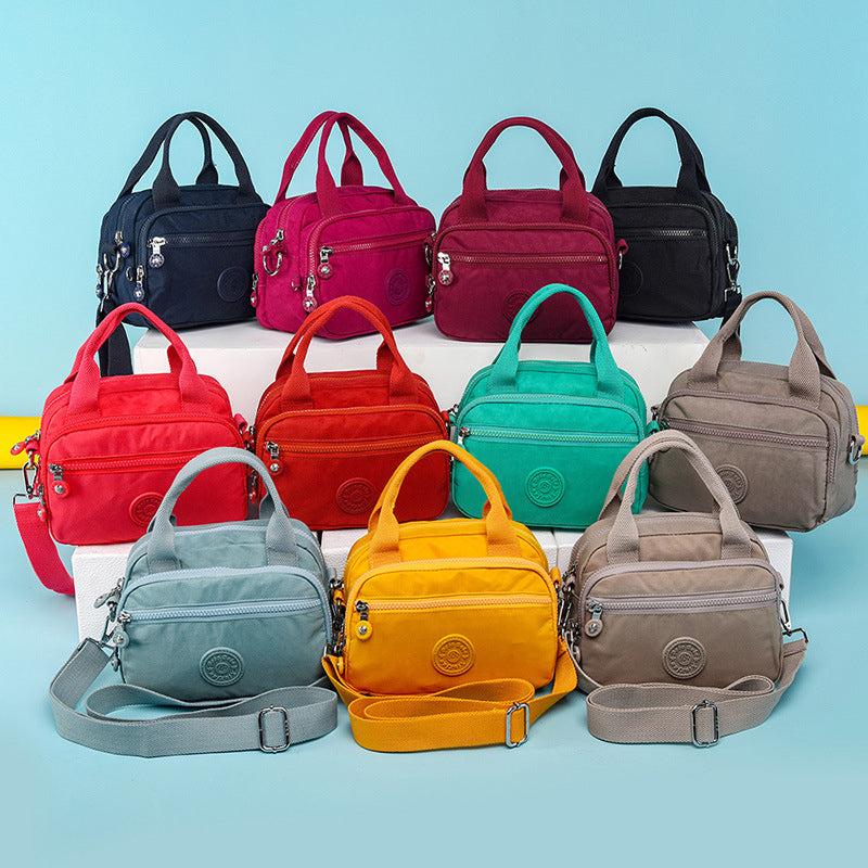 Bolso de mano impermeable para damas con varios compartimentos