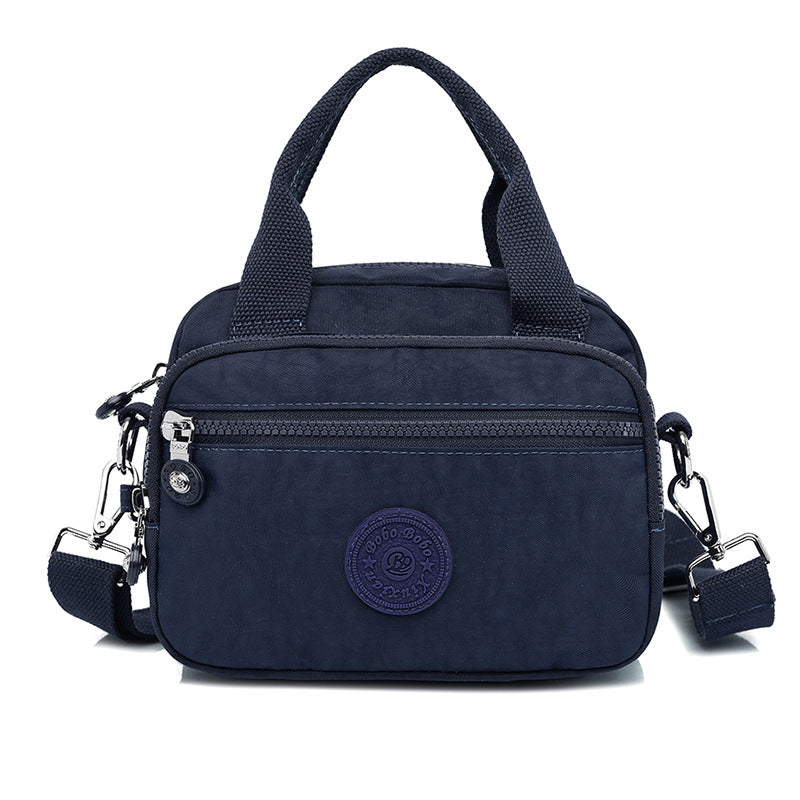 Bolso de mano impermeable para damas con varios compartimentos