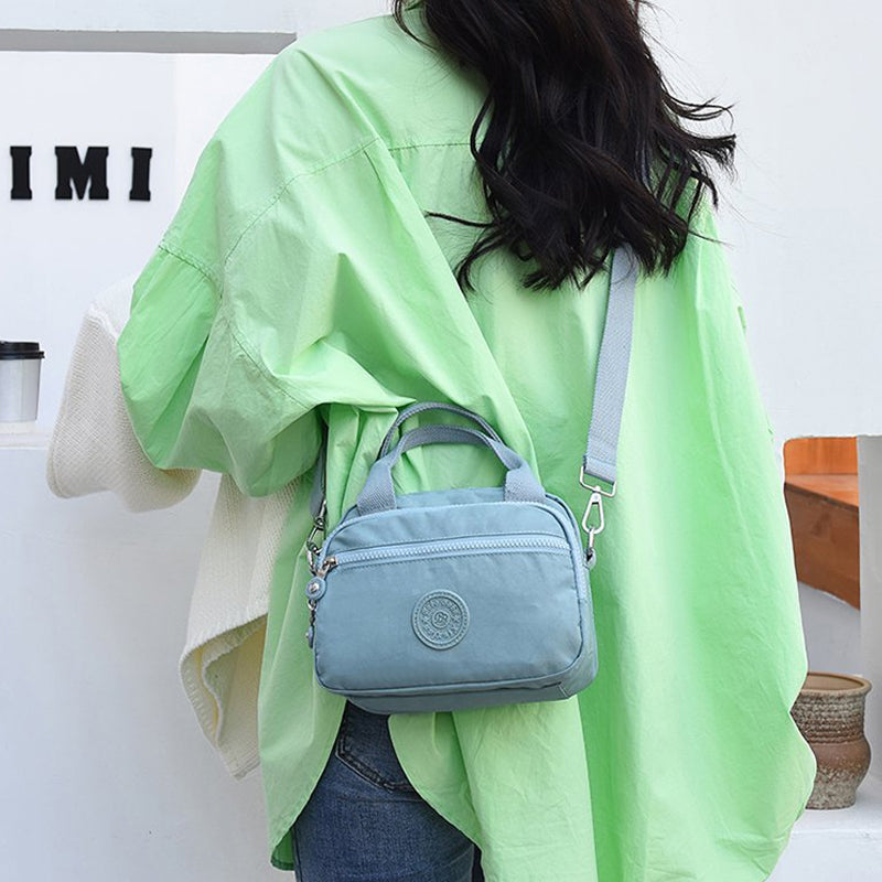 Bolso de mano impermeable para damas con varios compartimentos