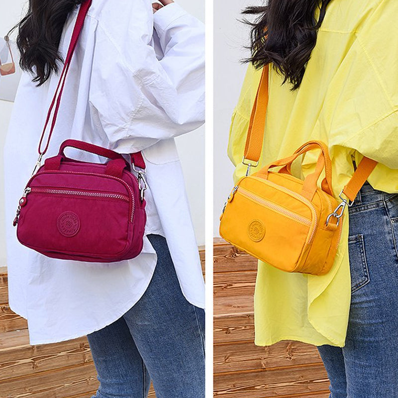 Bolso de mano impermeable para damas con varios compartimentos