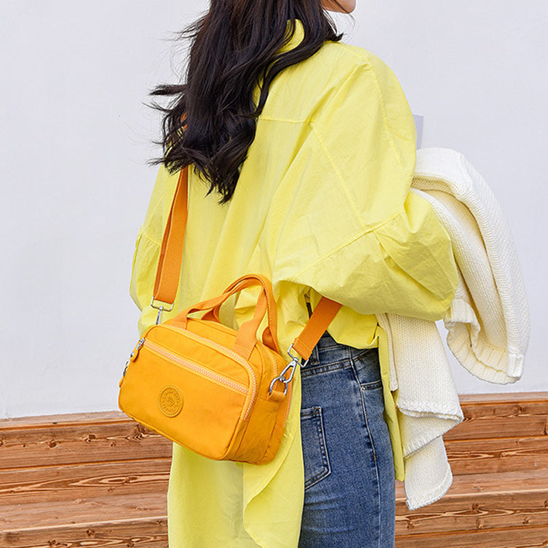 Bolso de mano impermeable para damas con varios compartimentos