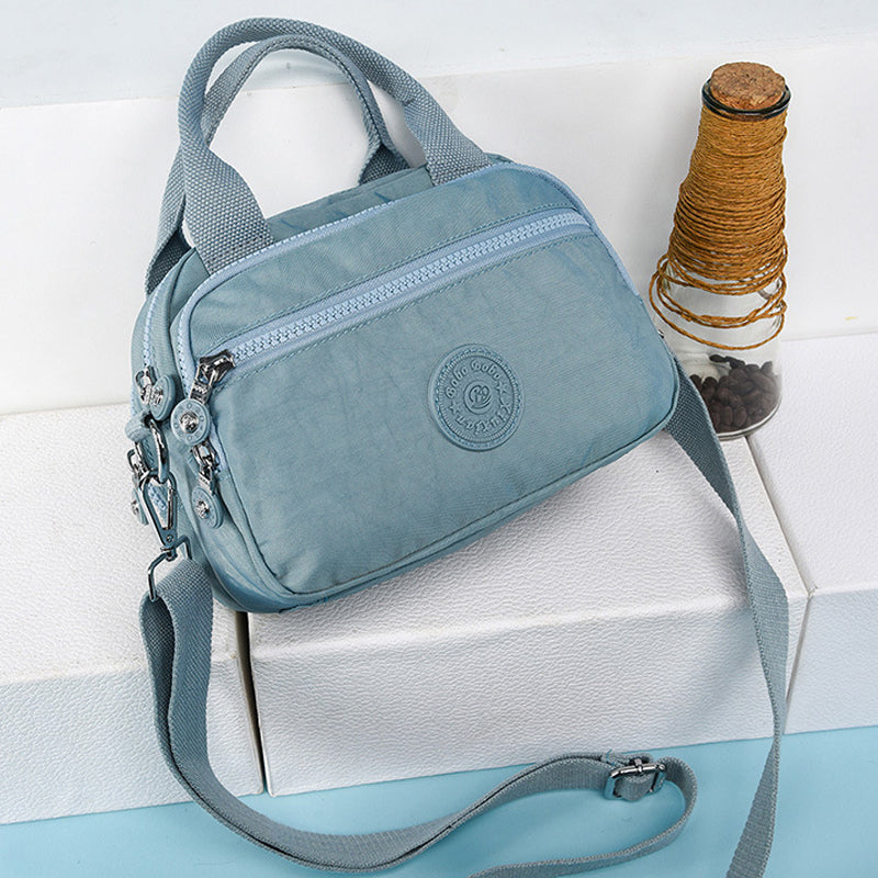 Bolso de mano impermeable para damas con varios compartimentos