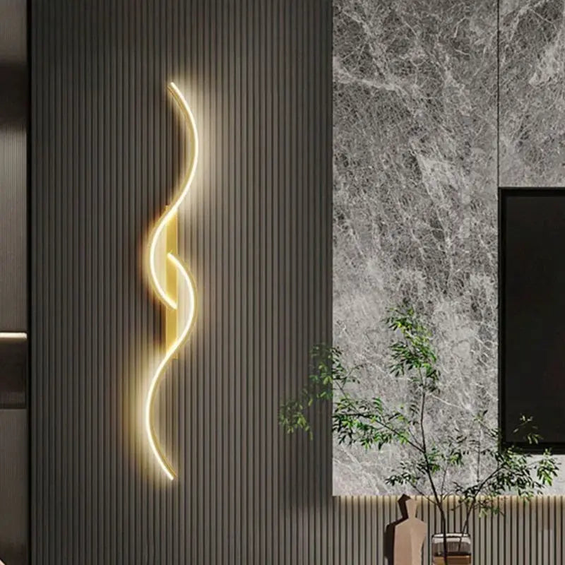 Moderna lámpara de pared LED en forma de ola – regulable y elegante en oro/negro