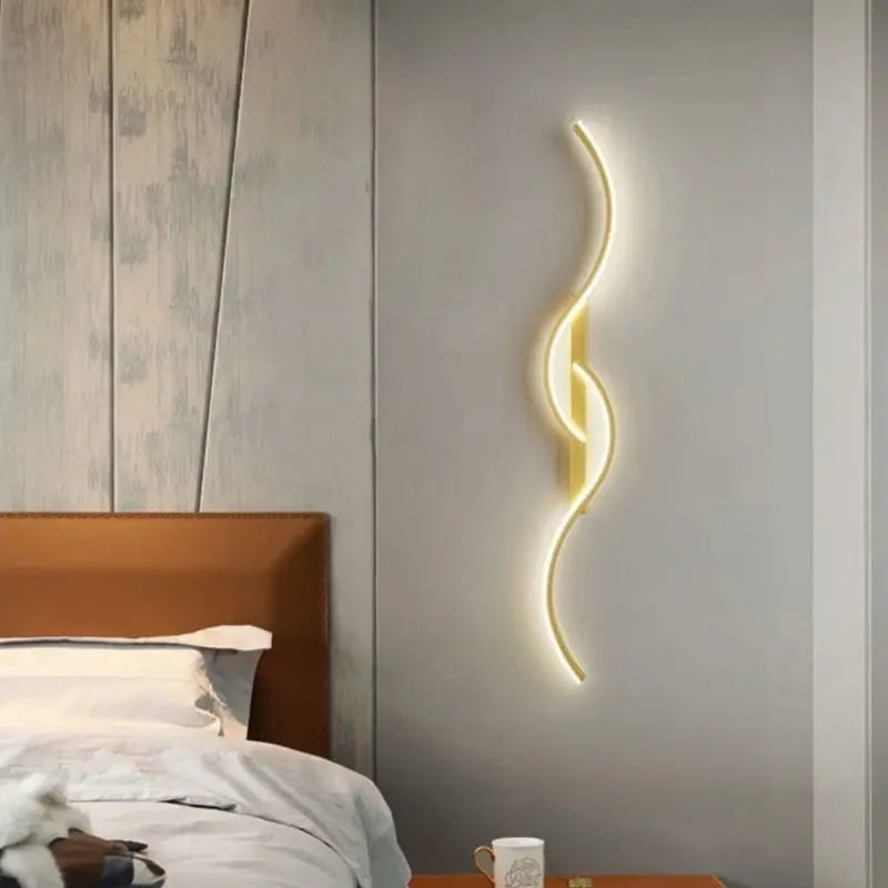 Moderna lámpara de pared LED en forma de ola – regulable y elegante en oro/negro